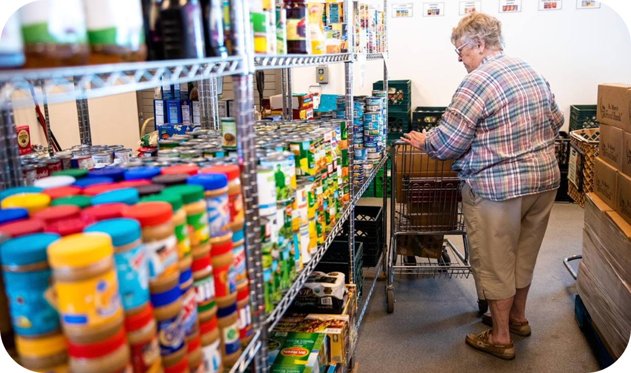 A woman in a pantry counting stock of items